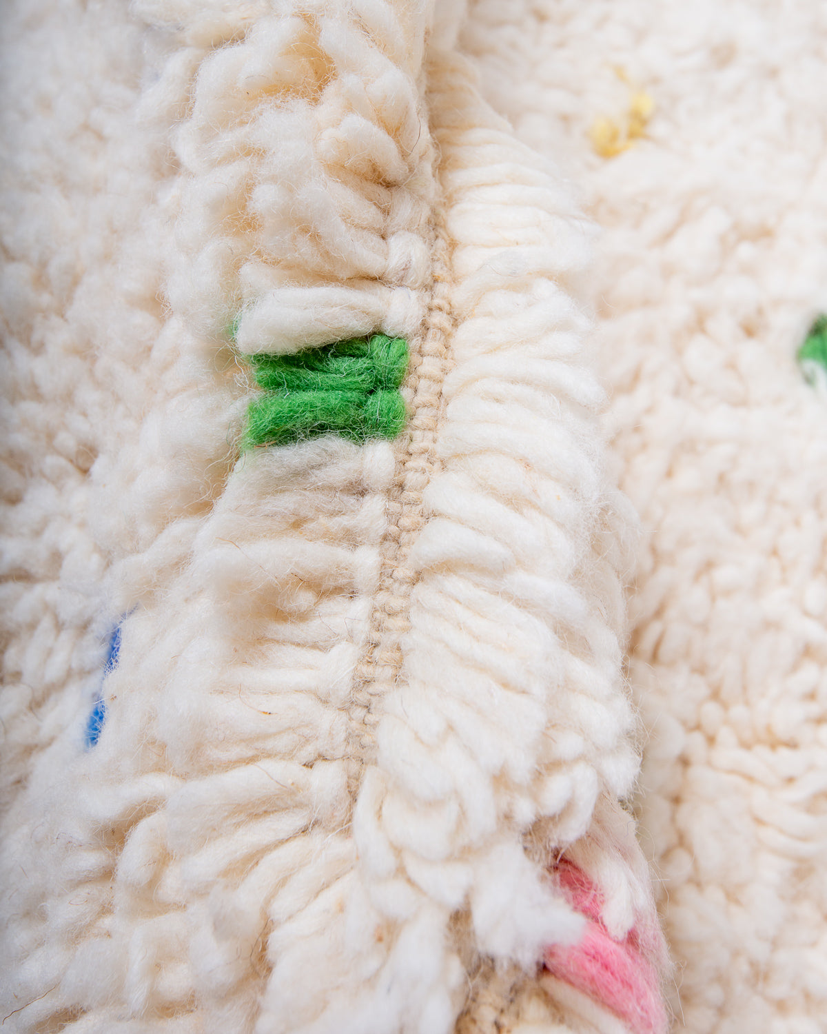 Modern, designer, handcrafted Berber rug from Morocco. Beniourain carpet with beautiful colours and patterns and fluffy wool texture.